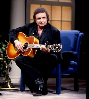 Johnny Cash and John Denver team up for "Country Roads" 