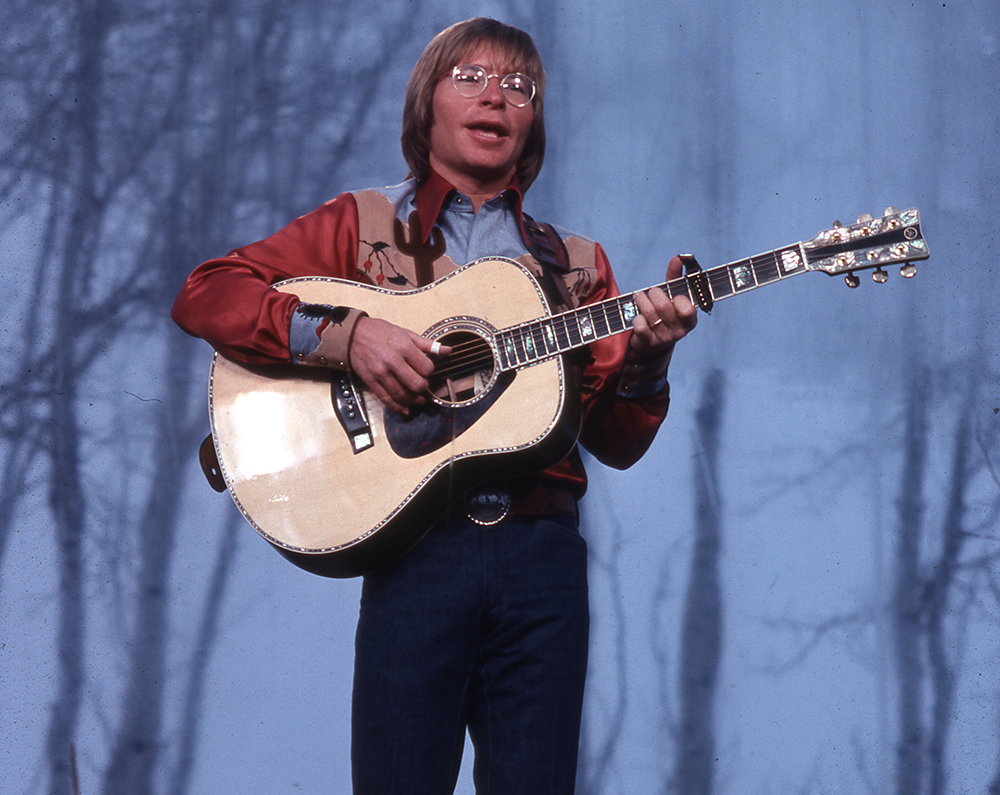 Johnny Cash and John Denver team up for "Country Roads" 