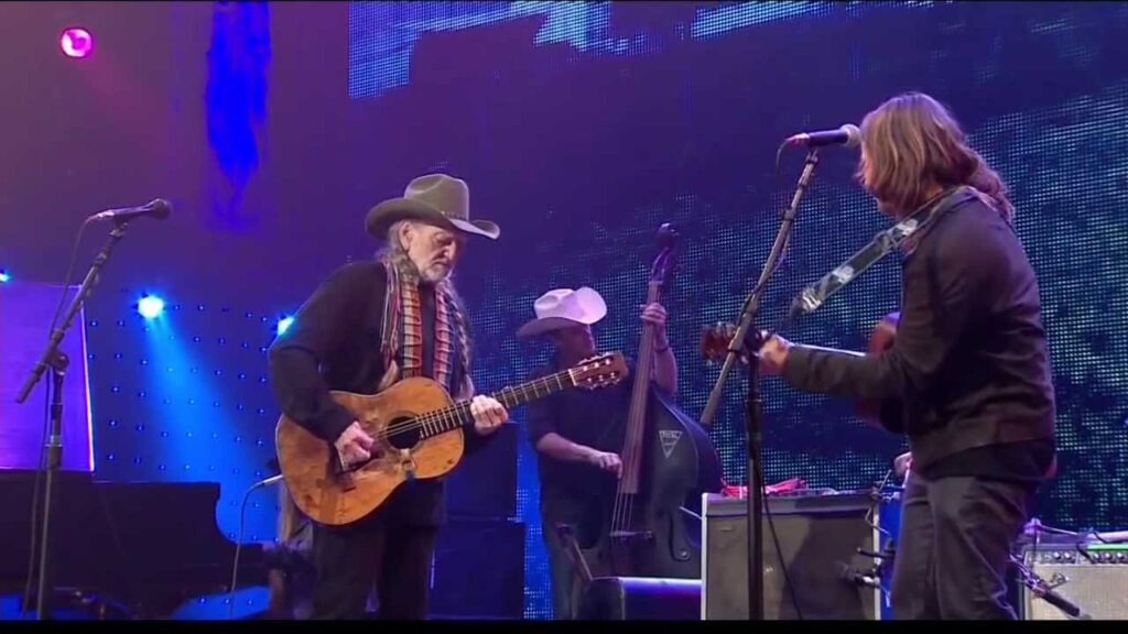 Lukas Nelson and Willie Nelson together on stage